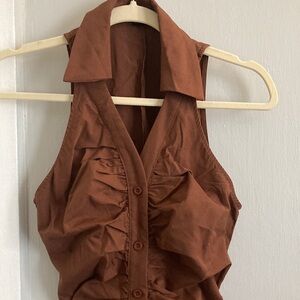 Brown sleeveless collared button down ruched dress. Mid thigh length. Never worn